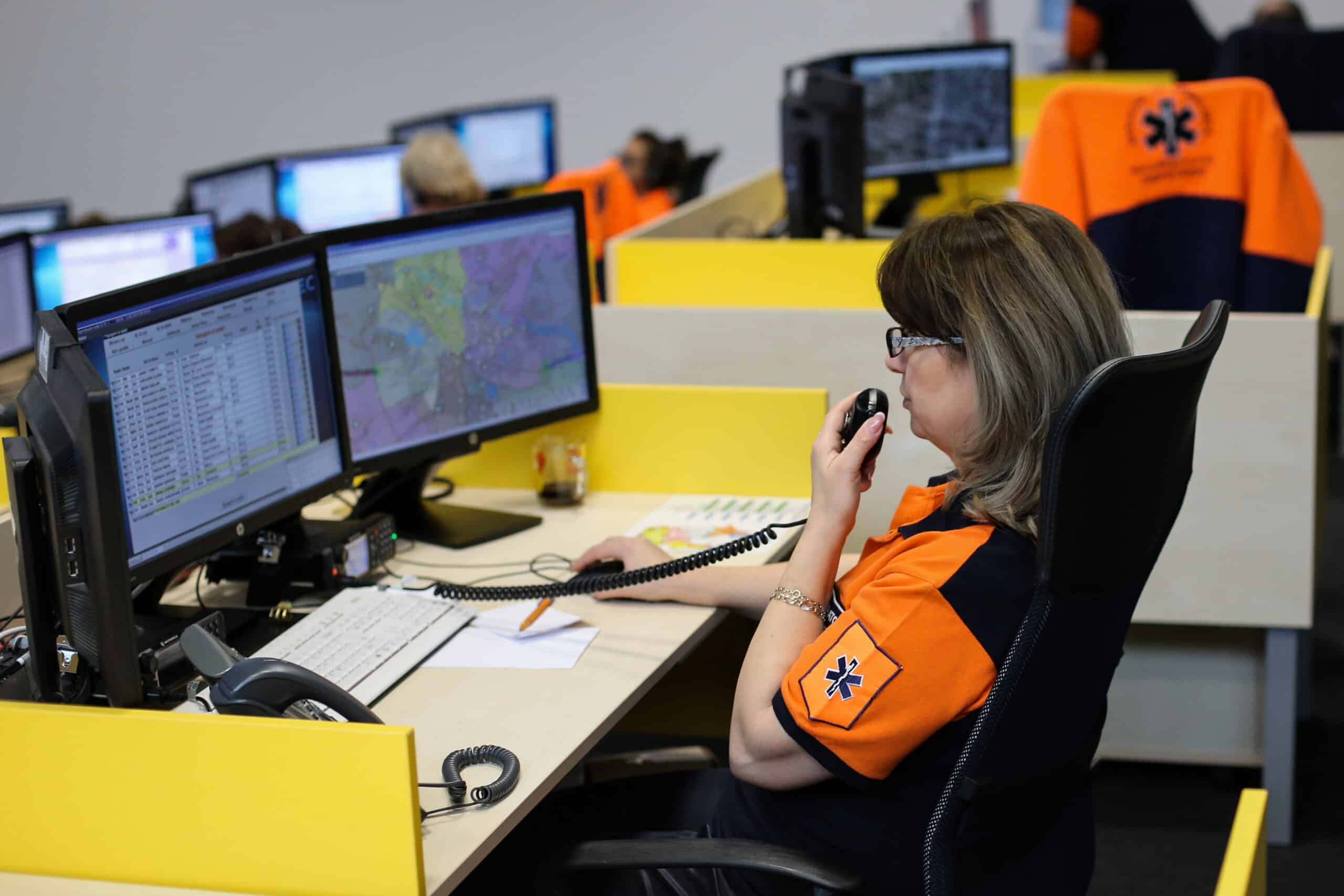 Dispatcher providing callers with instructions for chest compressions.