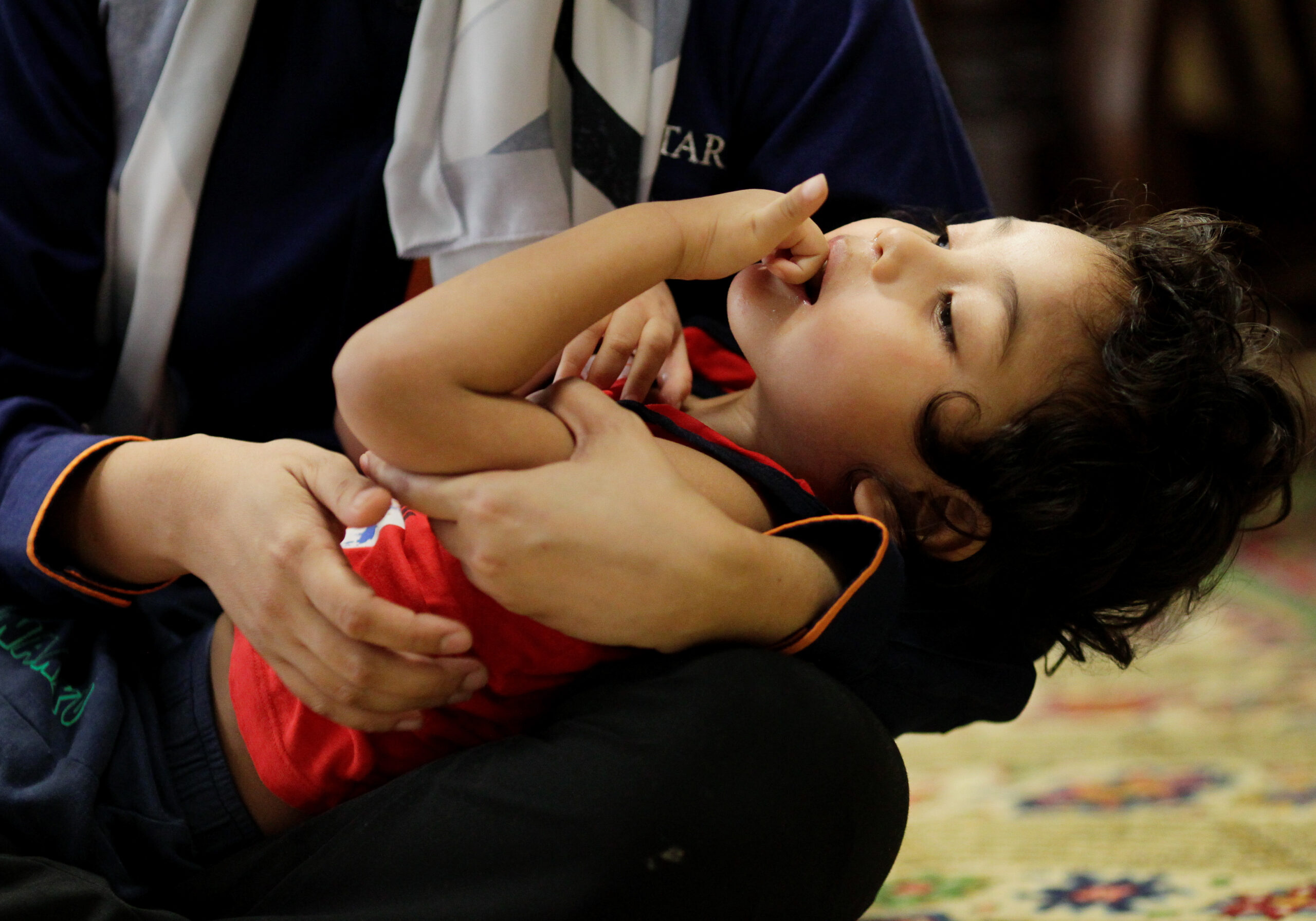 Child having seizure.