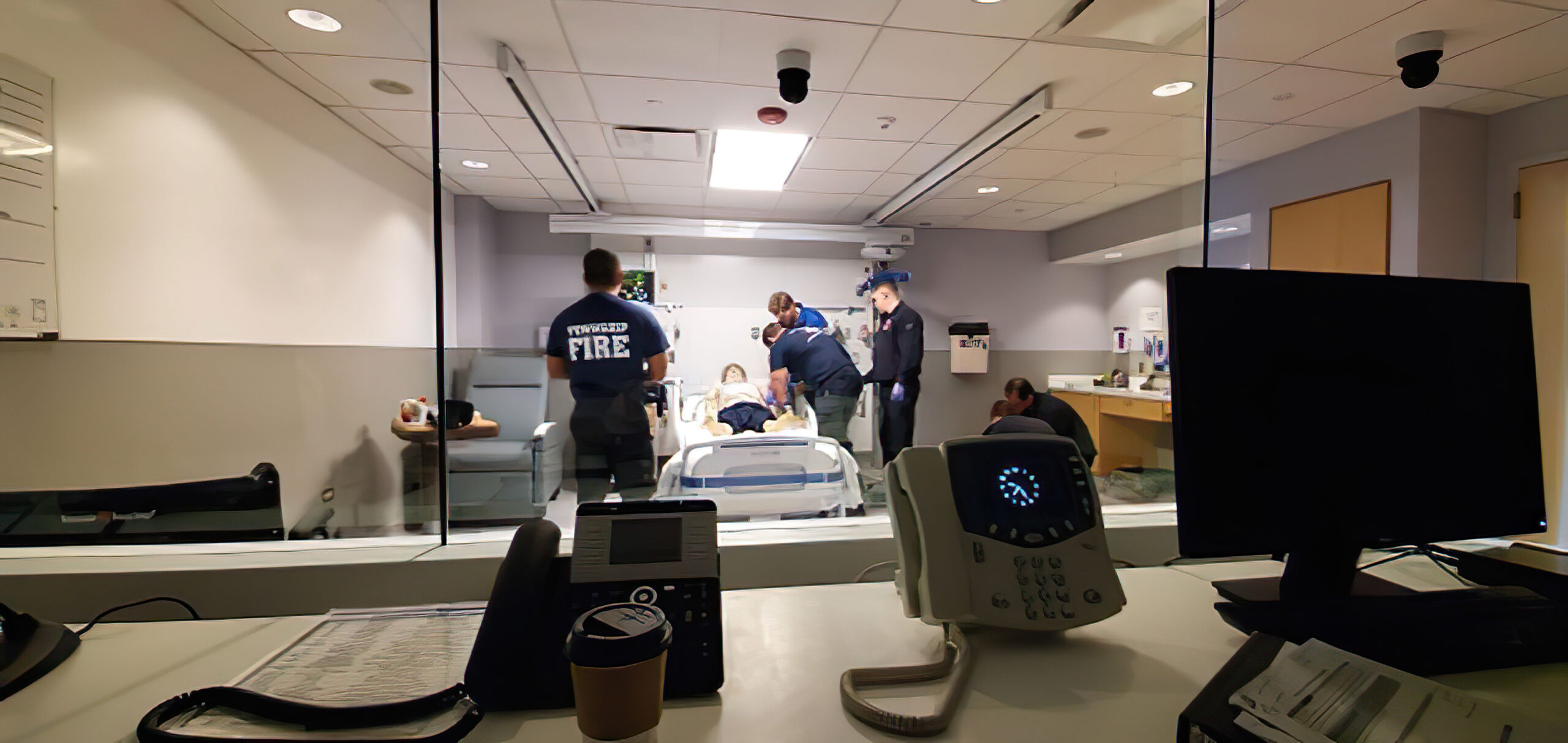 Clinicians-monitoring-students-in-high-fidelity-ACLS-simulation.