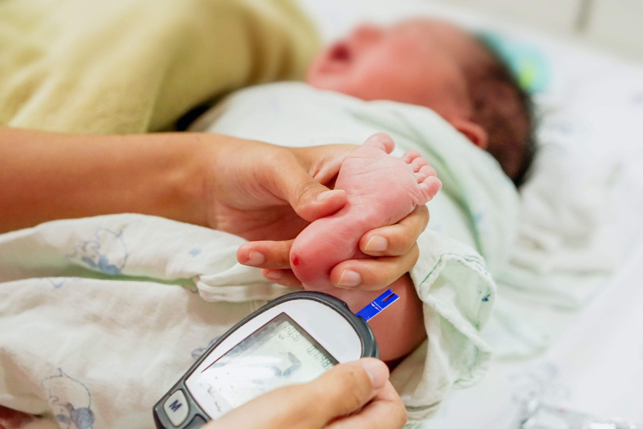 Infant blood glucose level assessment.