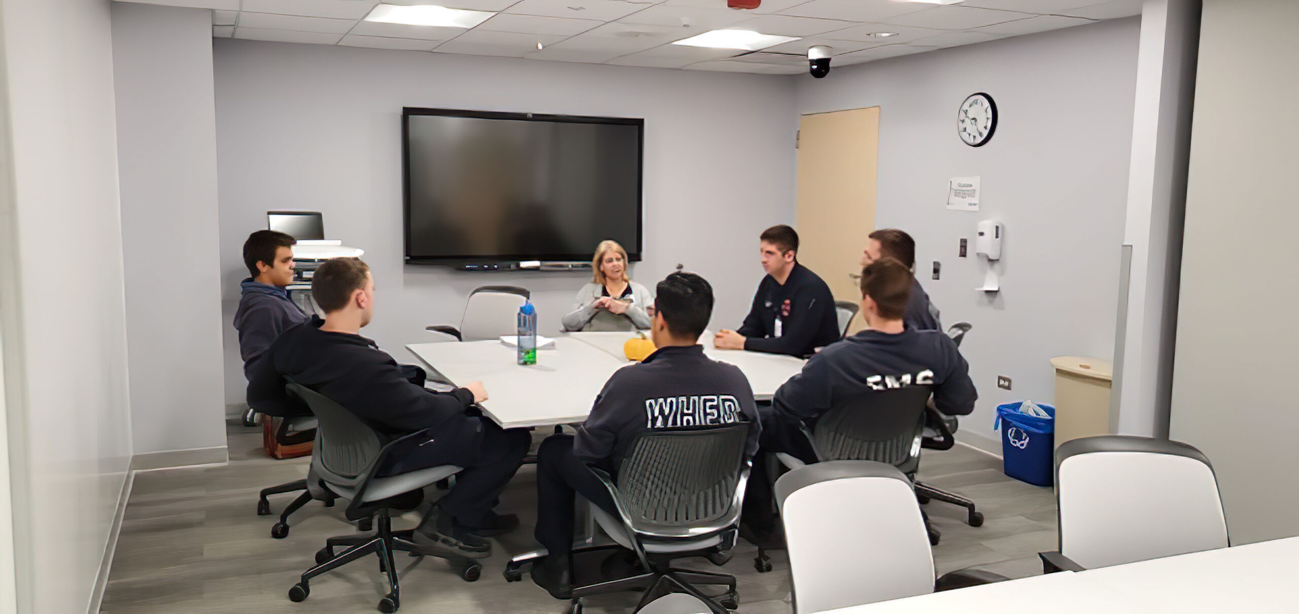 Students participating in debriefing.